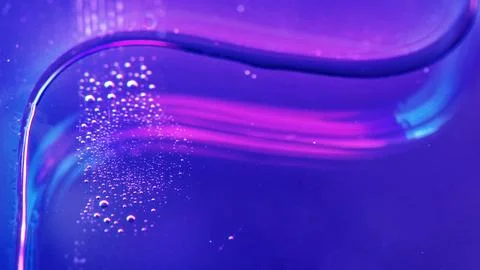 Vibrant neon purple liquid background Ilustración de archivo