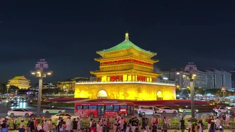 Vibrant Night Scene of Illuminated Bell Tower in Xi'an City Center, China Vídeos de archivo 337096169