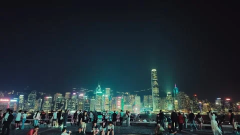 Vibrant nighttime cityscape of Hong Kong with numerous towering Vidéo 348794341