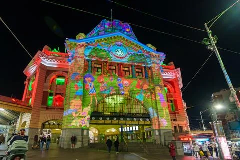Vibrant Nighttime Projection Mapping Transforms Historic Flinders Street St.. Stock Photos