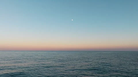 Vibrant ocean waves at sunset Stock Footage 248126323