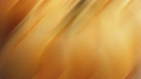 Vibrant orange abstract background with dynamic light streaks Stock Illustration