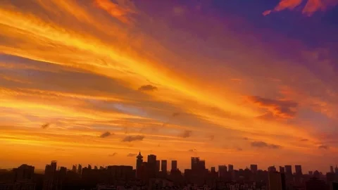 Vibrant Orange and Purple Sunset Over the City Skyline Shanghai China Stock Footage 346337161