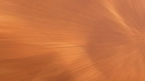 Vibrant orange background with dynamic radial light effects Stock Illustration