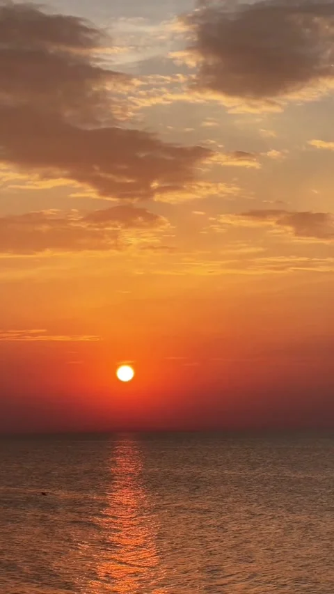 Vibrant Orange Red Ocean Sunset Reflection Stock Footage 317631776