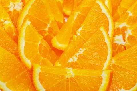 Vibrant orange slices create a refreshing and juicy citrus background texture Stock Photos