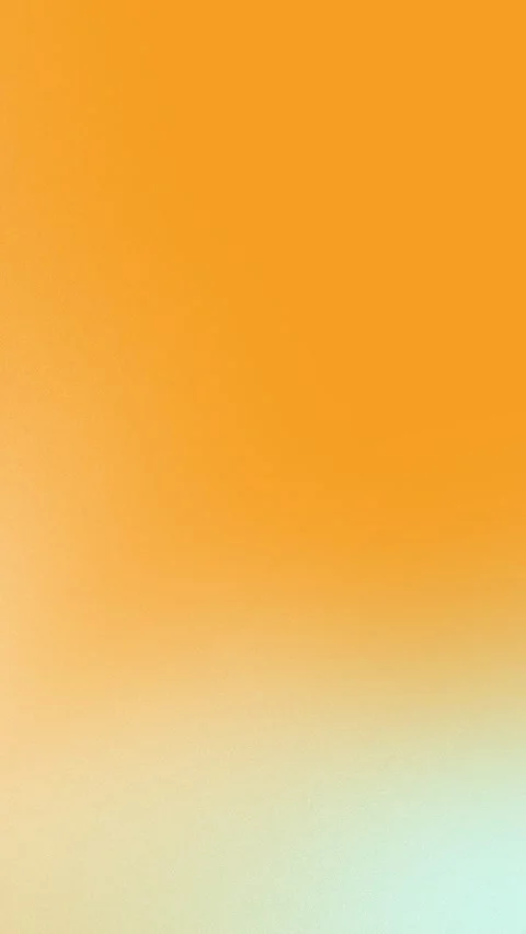 Vibrant orange to soft teal gradient with grain texture, seamless loop Stock Footage 309855899