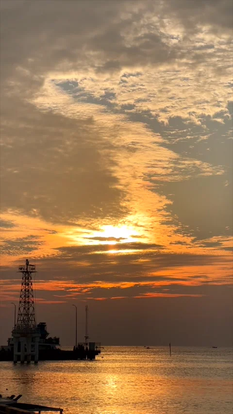 Vibrant orange sunset over the tropical islands of Karimunjawa, Indonesia. Stock Footage 338012536