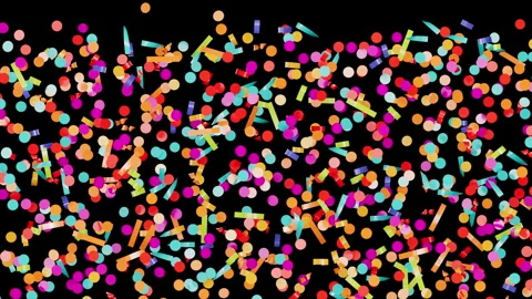 Vibrant party streamers and round paper pieces descend slowly. Vídeo Stock 344423648