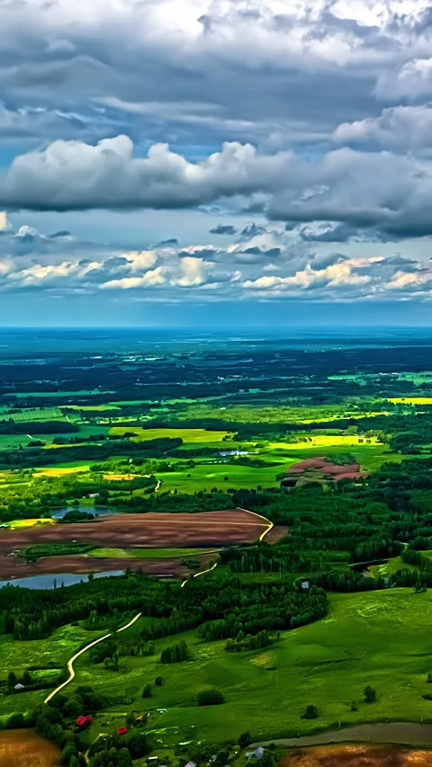 Vibrant Patchwork Farmland With Moving Cloud Shadows Vertical Timelapse Stock Footage 343008520