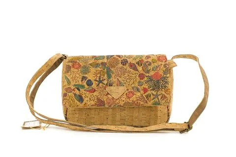 Vibrant patterned cork bag with elegant silhouette. Stock Photos