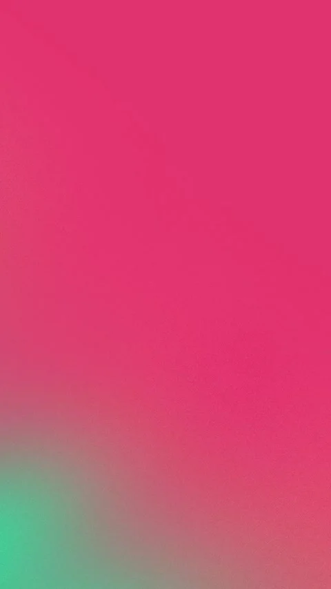 Vibrant pink and green gradient with grainy texture, seamless loop background. 库存影片 310143421