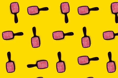 Vibrant pink combs pattern on yellow background. Pop art design Stock Photos