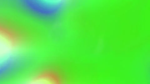 Vibrant pink glowing energy ring rotating against a solid bright green chroma 库存影片 344142242