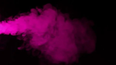 Vibrant pink smoke billowing and swirling against a stark black background Stock Footage 340266542