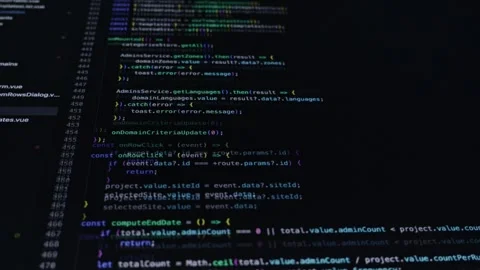 Vibrant programming code displayed on a dark computer screen, illustrating .. Stock Footage 311932063