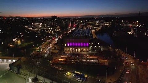 Vibrant Purple Facade of Dublin Train Station at Sunset Stock Footage 332444660