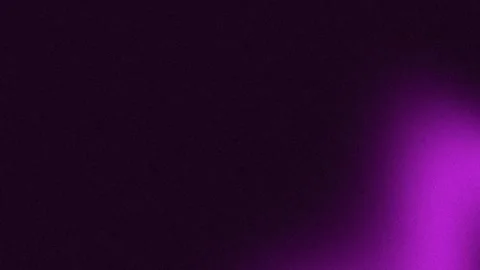 Vibrant purple light glow on a dark abstract background with copy space Stock Footage 339198472