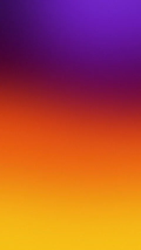 Vibrant purple to orange gradient with a grainy texture. Seamless loop Stockbeeldmateriaal 309957036