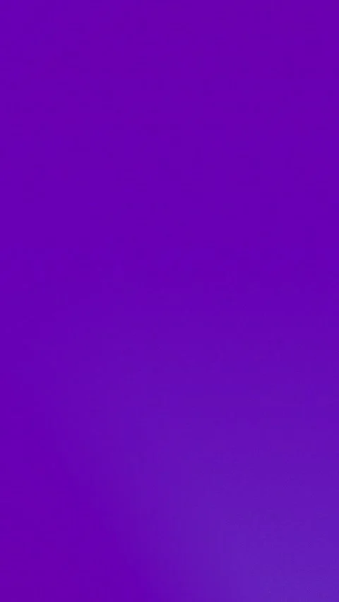 Vibrant purple seamless loop background with a subtle gradient. 4K resolution. Stock Footage 309856239