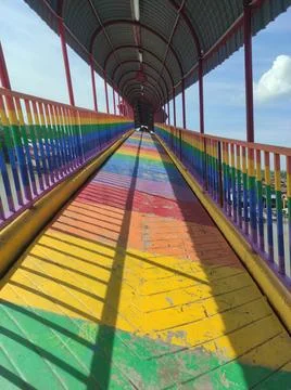 Vibrant Rainbow Bridge Path with Shadows Stock Photos