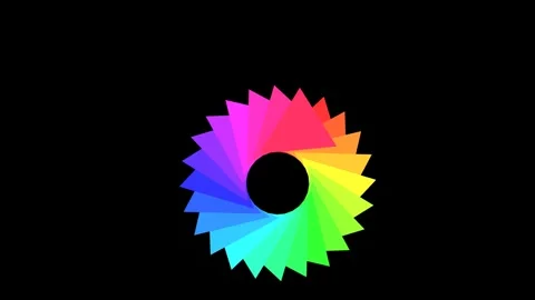 A vibrant rainbow colored gear shape isolated on a solid black background Video stock 335117192