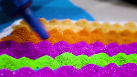 Vibrant rangoli making close-up Stock Footage 320998827