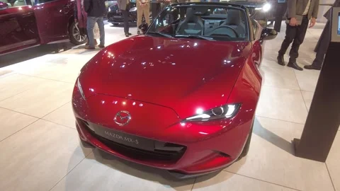 Vibrant red 2026 mazda mx 5 miata brussels motor show roadster model sports car Stock Footage 328206919
