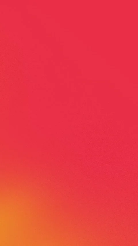 Vibrant red and orange gradient background with grain texture, seamless loop in Stock Footage 310143446