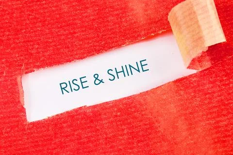 A vibrant red background frames a white paper strip with the uplifting words Stock Photos
