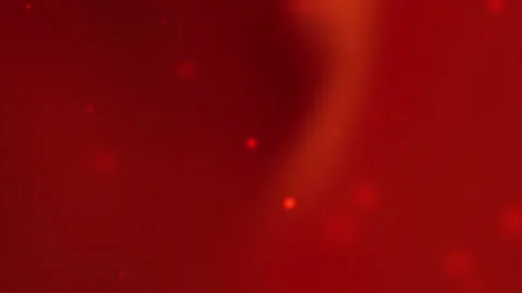 Vibrant red background with scattered glowing particles Stock Footage 332462132