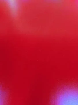 Vibrant Red Background with Soft Bokeh Light Effects. Stock Photos