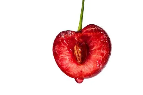 Vibrant Red Cherry Cross-Section with Stem on White Background for Creative.. 库存照片