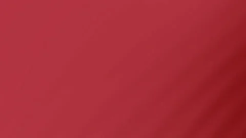 Vibrant red fabric with textured diagonal stripes in a dynamic pattern Video stock 315396397