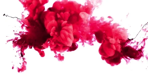 Vibrant red ink dissolves slowly in clear white liquid motion Stock Footage 327499686