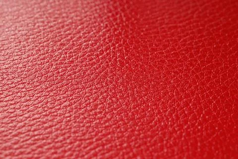 Vibrant red leather texture background with detailed grain pattern, close-up  Stock Photos