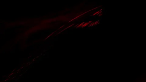 Vibrant red light streaks fly diagonally in a seamless loop Stock Footage 343115433