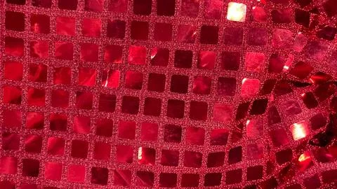 Vibrant red sequin fabric macro background. Square glitter texture for part.. Stock Photos