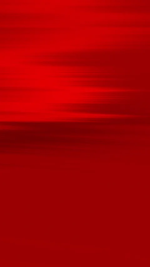 Vibrant red waves glide across the frame Видео 335668806