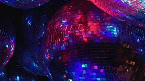 Vibrant Reflections Dancing on Mirror Balls in a Glowing Club Ambiance Stock Footage 334925082