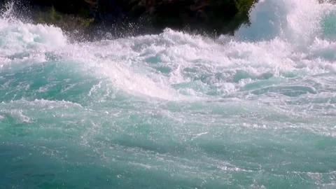 Vibrant river rushing through stunning Andes of Patagonia Stock Footage 288150998