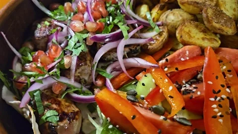 Vibrant Roasted Vegetable Plate Featuring Fresh Herbs And Garnishes Video stock 324967482