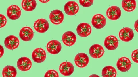 Vibrant Rotating Tomatoes on Green Background Stock Footage 278385758