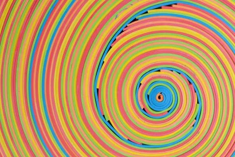Vibrant rubber strips coil pattern lower-right center Stock Photos