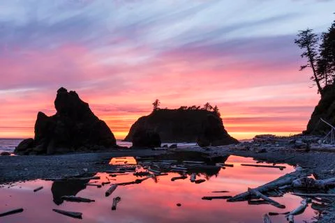 Vibrant Ruby Beach Sunset Silhouette Stock Photos