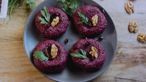 Vibrant serving detail: capturing walnut and beet texture Stock Footage 342200486