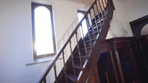 Vibrant shining sun at a window of a chappel with the logo of Apple on a Vídeo Stock 127033660