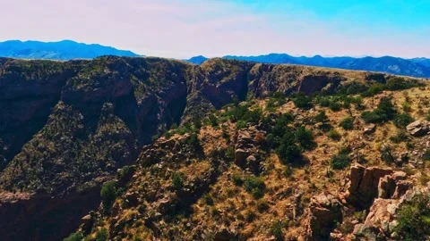 Vibrant sky and mountains, both close-range and in the distance Stock Footage 211783161