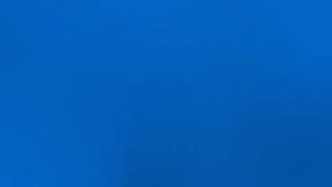 Vibrant solid blue seamless loop background. 4K smooth texture. Stock Footage 309700887