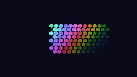 A vibrant spectrum of hexagonal shapes arranged in a gradient against black Video stock 335117655